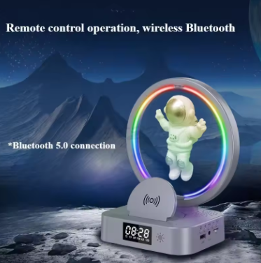 LAMPARA CON ASTRONAUTA COLGANDO BOCINA BLUETOOTH